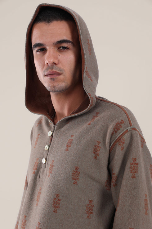 Hooded sweater with part front buttons