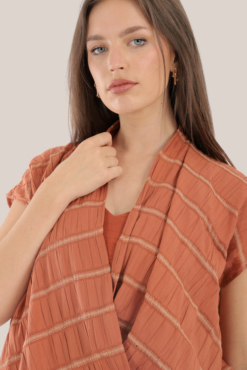Sleeveless wrap top with crinkle striped and draped front