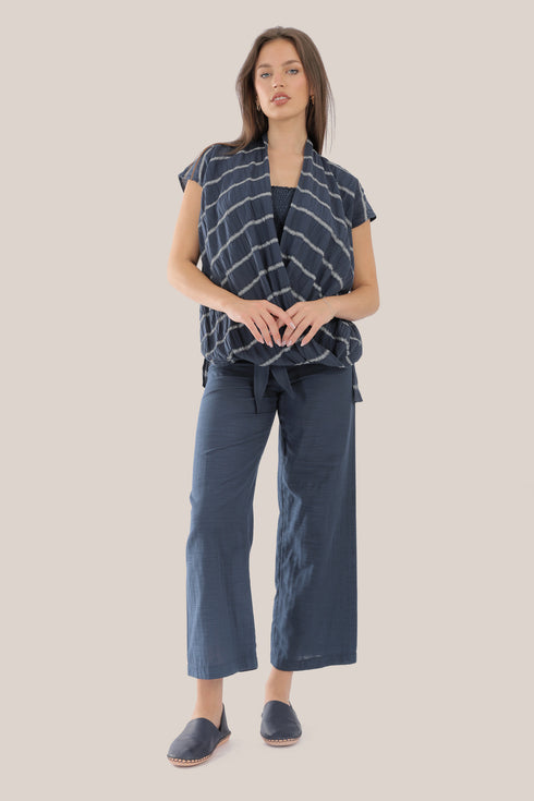 Sleeveless wrap top with crinkle striped and draped front