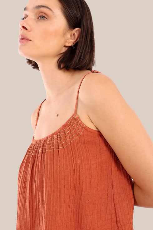 Sleeveless tank top with thin adjustable straps