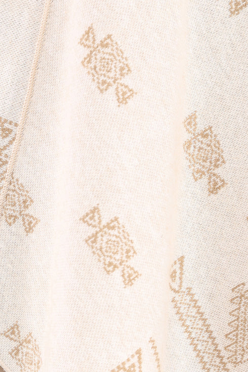 Patterned jacquard reversible asymmetric top