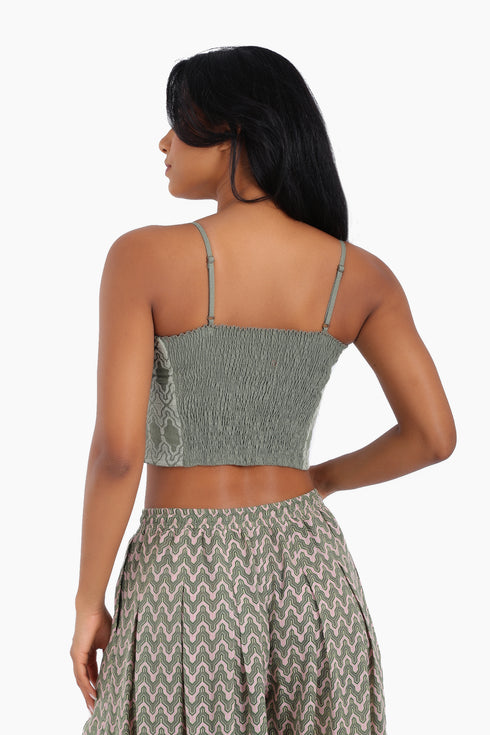 Embroidered short top in linen with adjustable straps