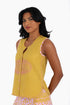 Embroidery short sleeveless top with round neckline