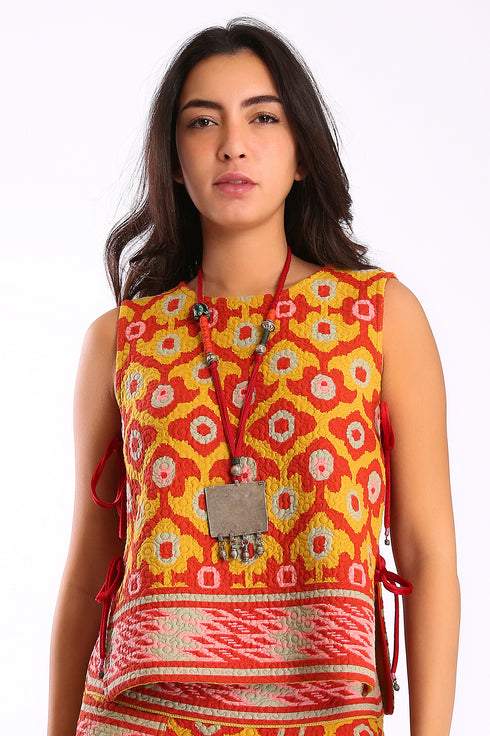 Sleeveless top with tie fastenings