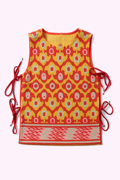 Sleeveless top with tie fastenings