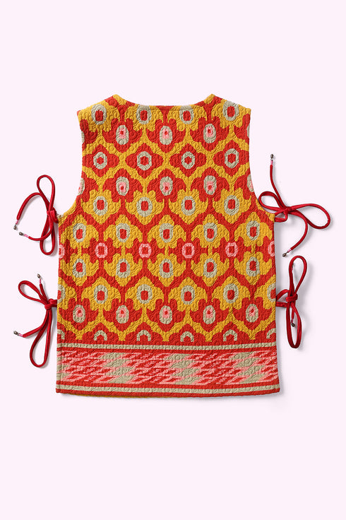 Sleeveless top with tie fastenings