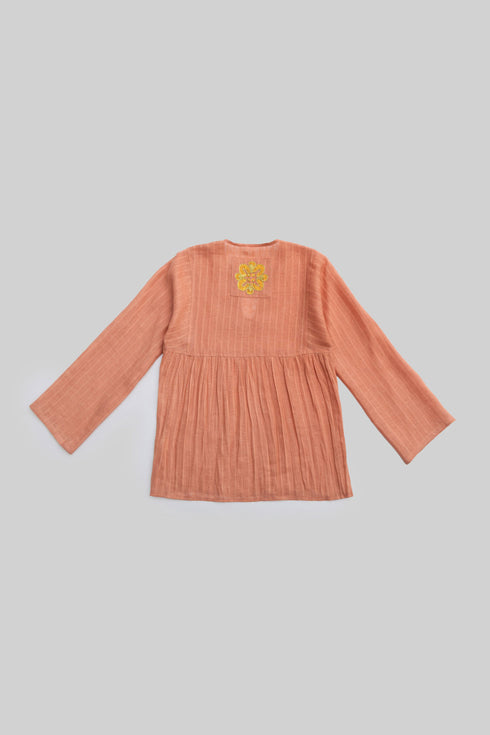 Striped linen top with printed flower on the back