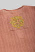Striped linen top with printed flower on the back