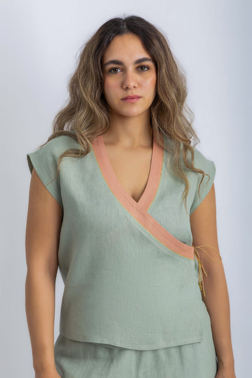 Linen wrap-detail sleeveless top with golden trim