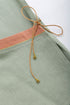 Linen wrap-detail sleeveless top with golden trim