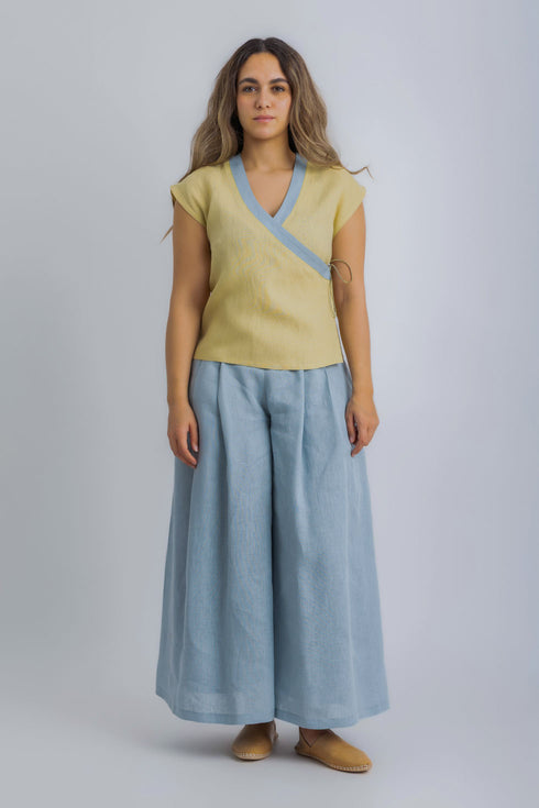 Linen wrap-detail sleeveless top with golden trim