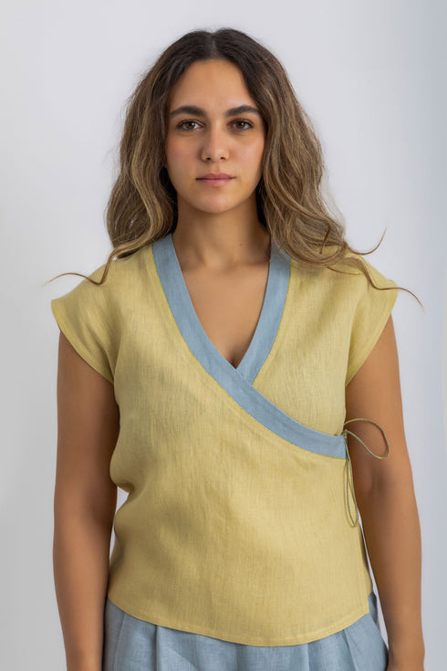 Linen wrap-detail sleeveless top with golden trim