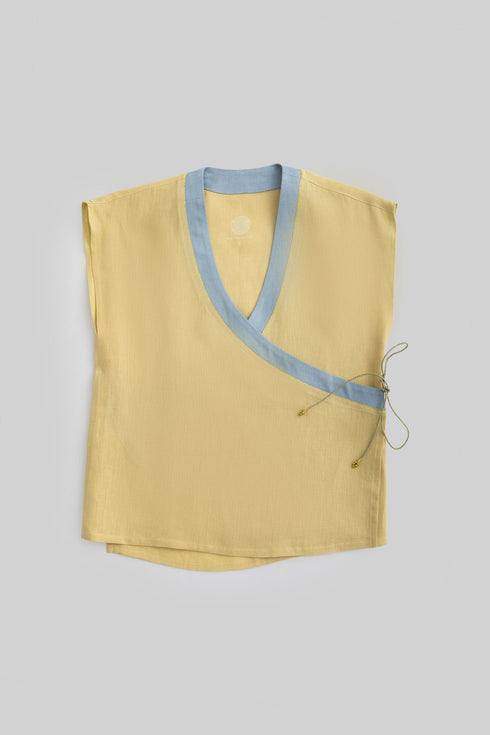 Linen wrap-detail sleeveless top with golden trim