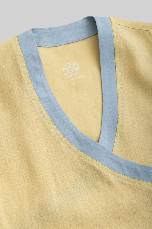 Linen wrap-detail sleeveless top with golden trim