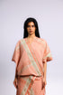 Woven crossover top with V-neckline