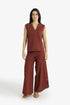 Hand embroidered sleeveless top with V neckline
