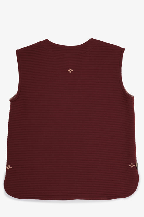 Hand embroidered sleeveless top with V neckline