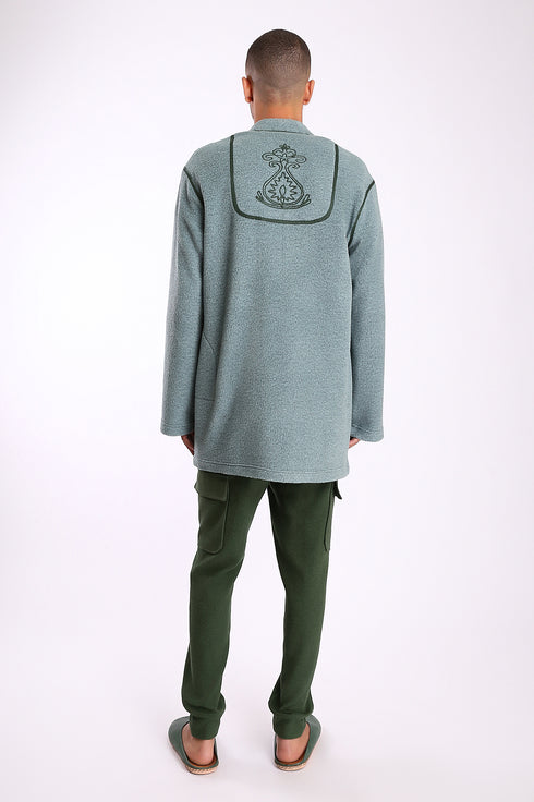 Jacket in faux fur with embroidery on the back