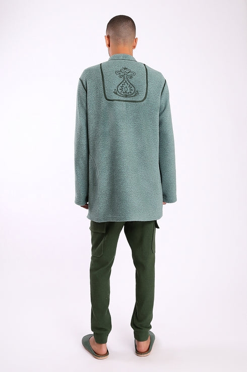 Jacket in faux fur with embroidery on the back