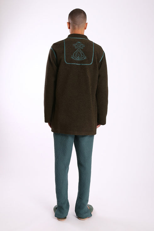 Jacket in faux fur with embroidery on the back