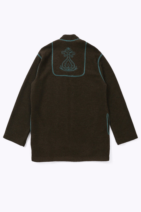 Jacket in faux fur with embroidery on the back