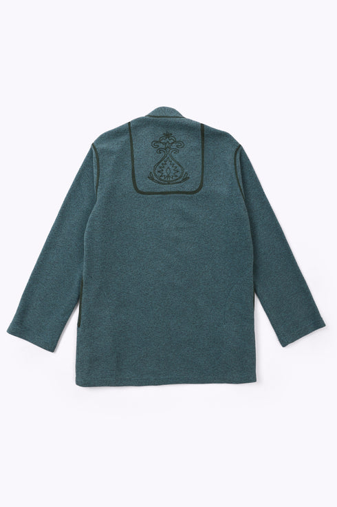 Jacket in faux fur with embroidery on the back