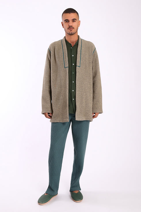 Jacket in faux fur with embroidery on the back