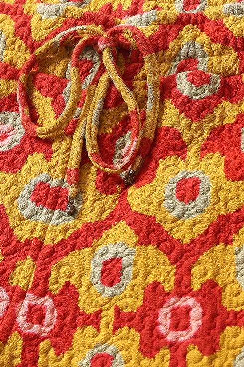 Straight leg pants in quilted printed cotton blend with elastic waist.