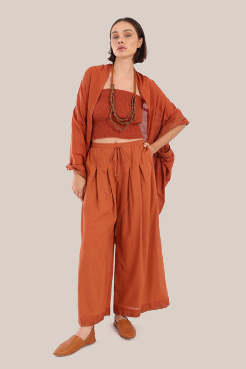 Embroidered cover up coat with short sleeves.