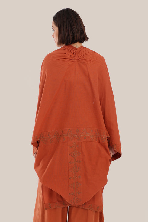Embroidered cover up coat with short sleeves.