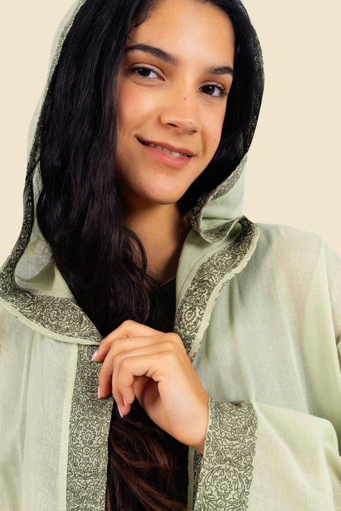 Embroidered long coat in cotton with hoodie