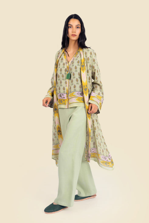 Coat in cotton gauze with asymmetric hemline