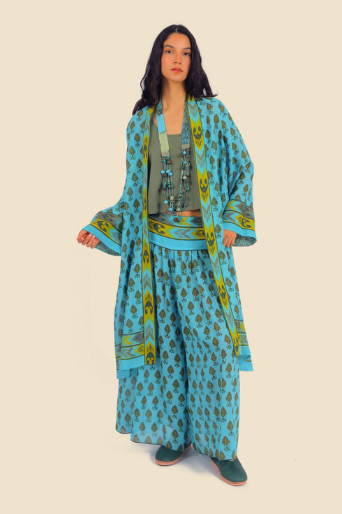 Coat in cotton gauze with asymmetric hemline