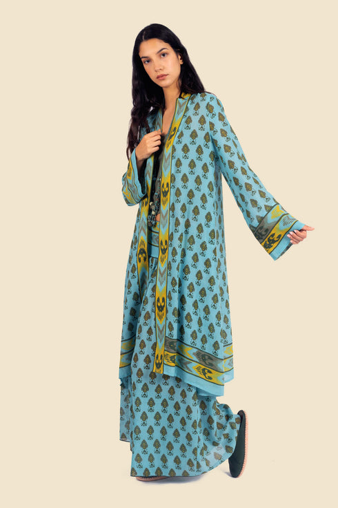 Coat in cotton gauze with asymmetric hemline