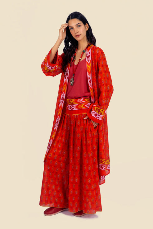 Coat in cotton gauze with asymmetric hemline