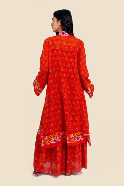 Coat in cotton gauze with asymmetric hemline