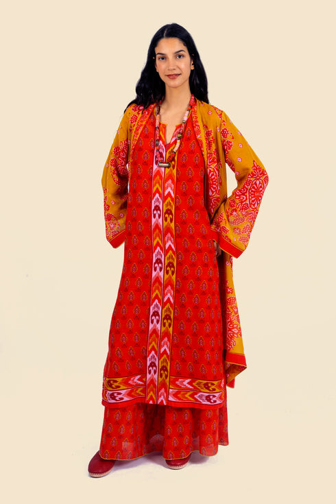 Coat in cotton voile with asymmetric hemline