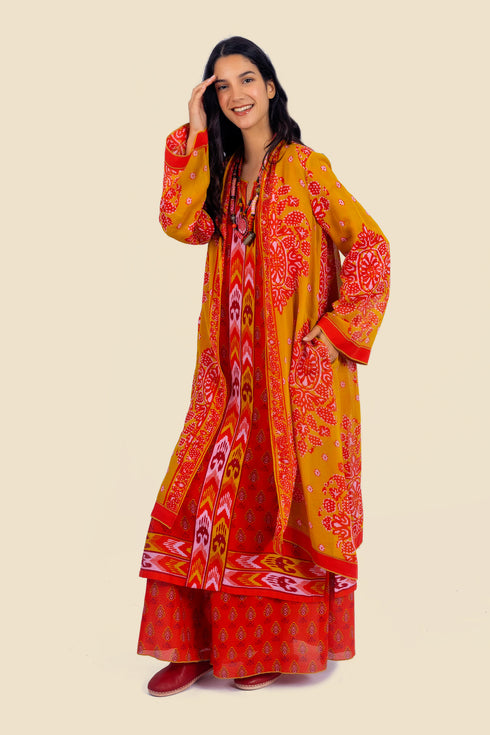 Coat in cotton voile with asymmetric hemline