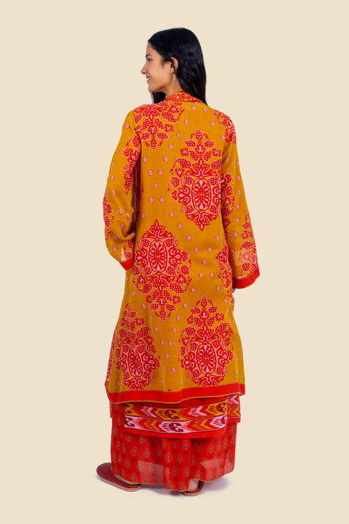 Coat in cotton voile with asymmetric hemline