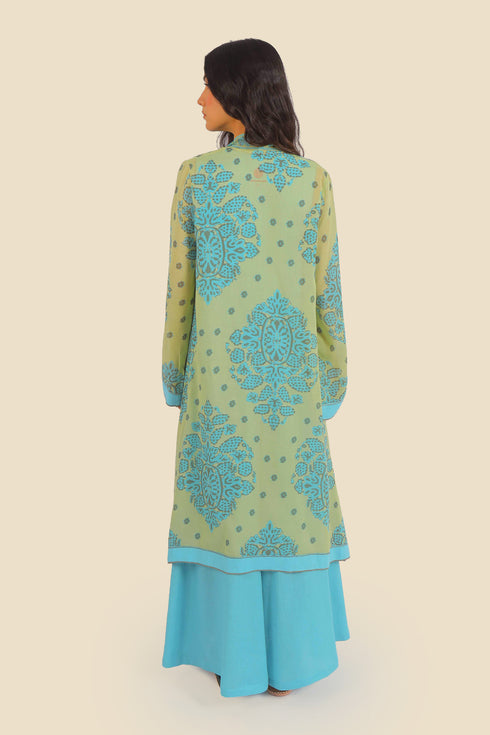 Coat in cotton voile with asymmetric hemline