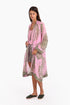 Coat in cotton voile with asymmetric hemline