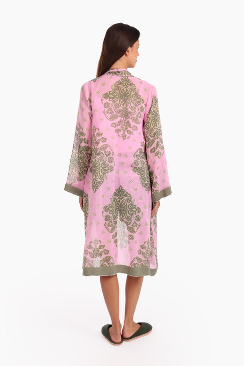 Coat in cotton voile with asymmetric hemline