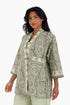Loose fit jacket in printed cotton with side slits