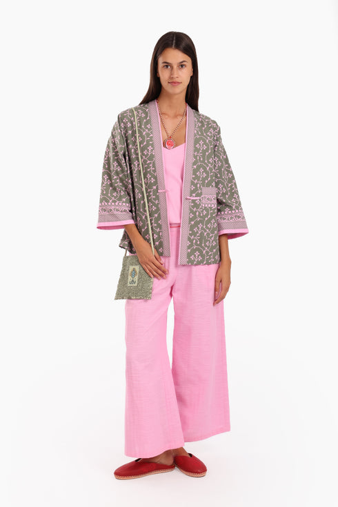 Short jacket in printed cotton with one front button and side slits