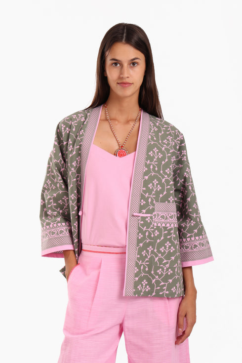 Short jacket in printed cotton with one front button and side slits