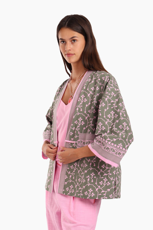 Short jacket in printed cotton with one front button and side slits