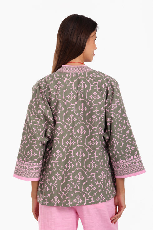 Short jacket in printed cotton with one front button and side slits