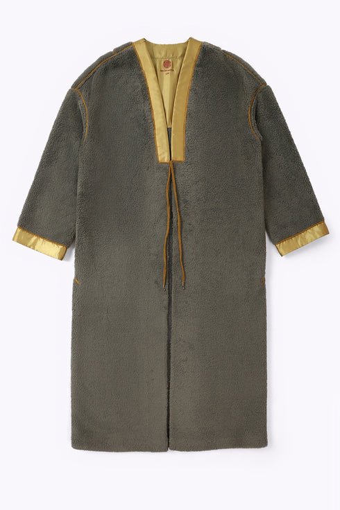 Long coat in faux fur with pockets