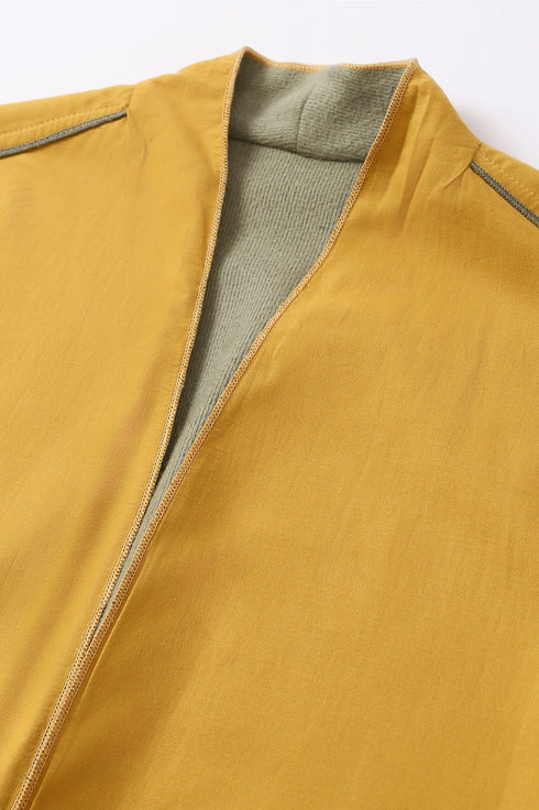 Reversible coat with front embroidered pocket