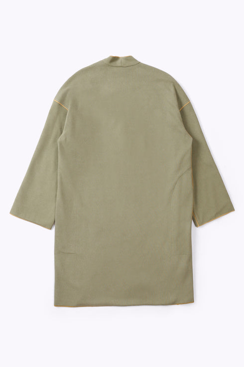 Reversible coat with front embroidered pocket